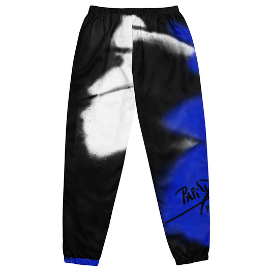 Back view showing the silhouette and expanding wing graphic detail of the SALA 3 | Attitude Monarca Azul pants by PapiJohn®. Gallery archive piece, rebel luxury aesthetic, and wearable art curated in Cadifornia by $arah Free 💎.