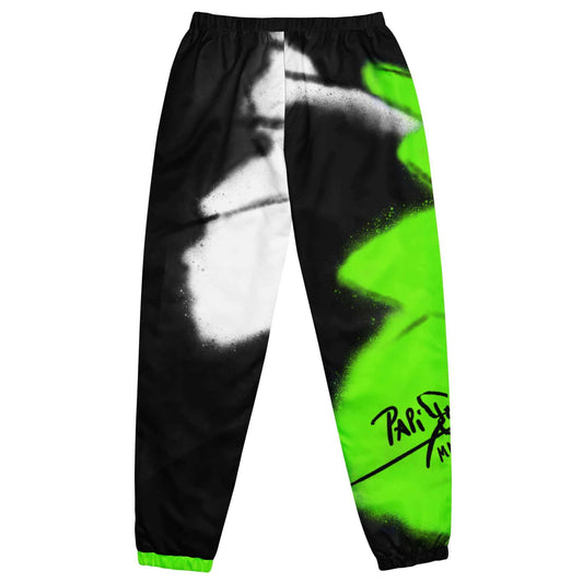 Back view showing the fit and high-voltage neon green butterfly wing graphic detail of the SALA 3 | Attitude Neón Monarca pants by PapiJohn®. Gallery archive piece, honest luxury aesthetic, and wearable art curated in Cadifornia by $arah Free 💎.