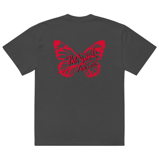 Back view showing the boxy oversized silhouette, dropped shoulders, and washed faded black vintage canvas of the SALA 3 | Attitude Oversize Red Eco Canvas by PapiJohn®. Honest luxury wearable art curated in Cadifornia by $arah Free 💎.
