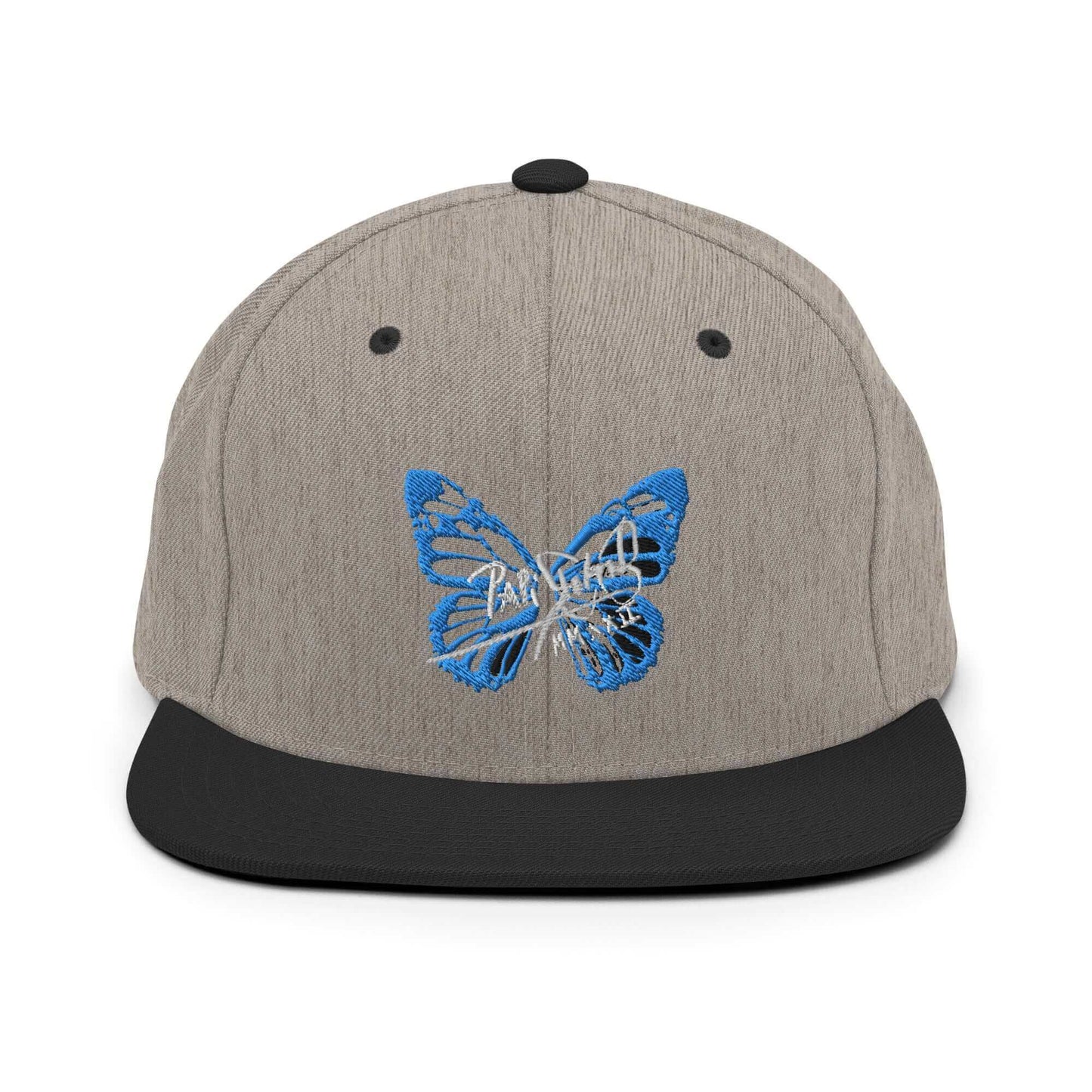 PapiJohn® The Blue Butterfly Snapback Archive in black heather textured weave front view tracing the blue butterfly stitch work over the curated grain matrix | Sala 1 Wearable Art Fashion