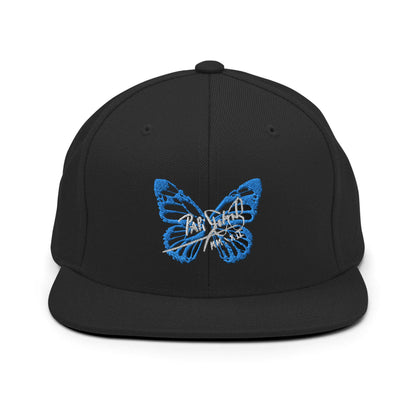 PapiJohn® The Blue Butterfly Snapback Archive in solid black front view showcasing the iconic blue butterfly silhouette embroidered in sharp volumetric precision stitch | Sala 1 Wearable Art Fashion