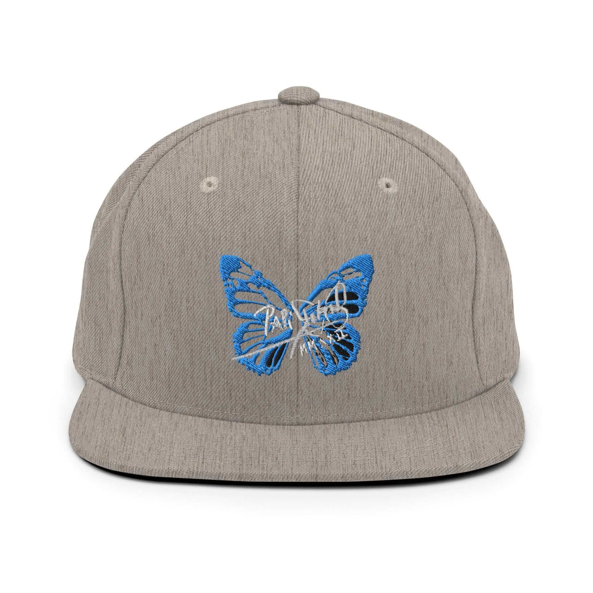 PapiJohn® The Blue Butterfly Snapback Archive in classic heather grey front view accentuating the striking deep blue colorway of the custom butterfly emblem | Sala 1 Wearable Art Fashion