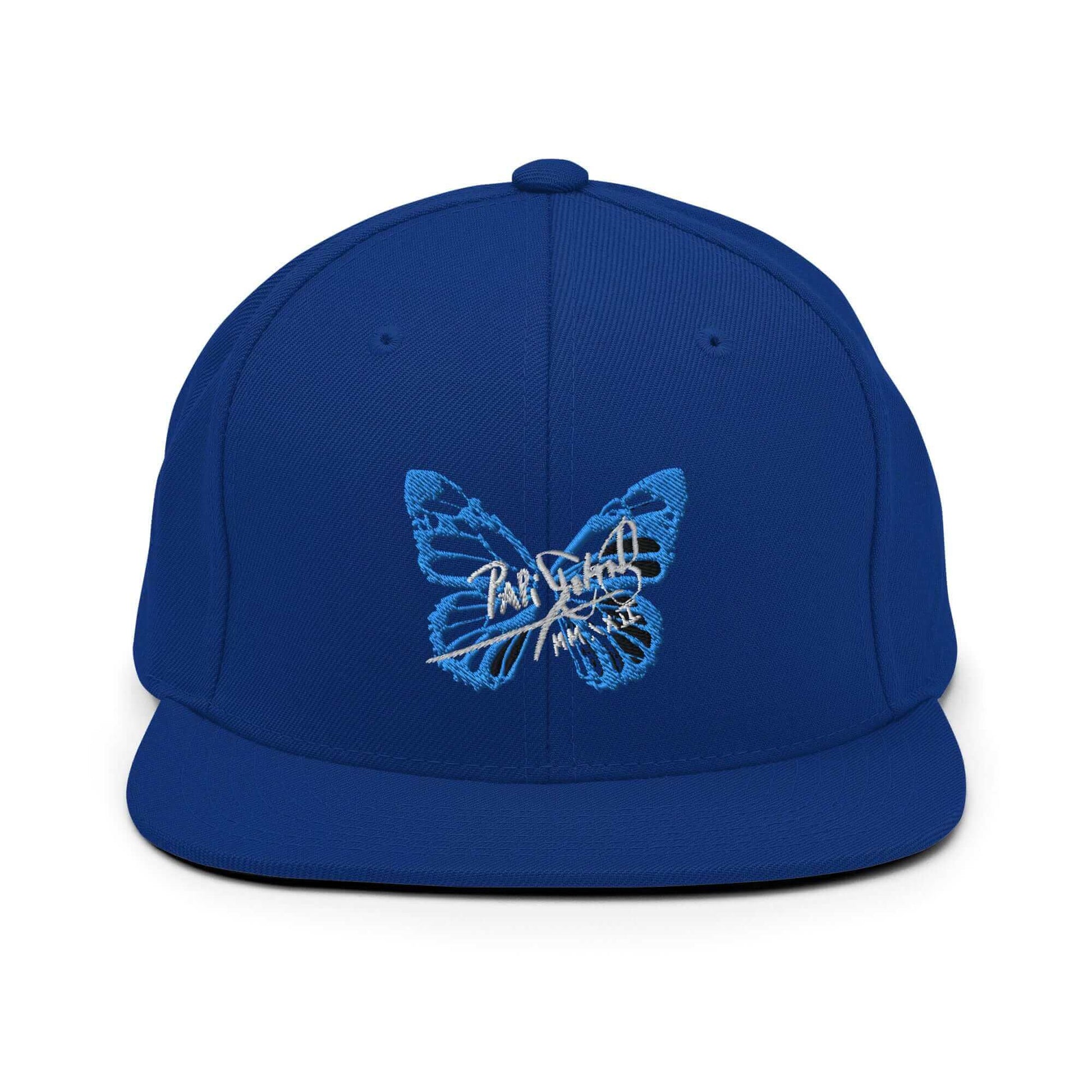 PapiJohn® The Blue Butterfly Snapback Archive in vibrant royal blue front view displaying the rich tonal layers of the electric blue butterfly script stitch | Sala 1 Wearable Art Fashion
