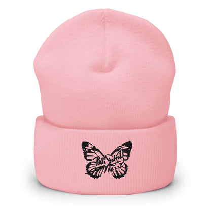 PapiJohn® The Butterfly Signature Black Edition beanie in conceptual baby pink front view tracing the delicate contrast of the high-fidelity black stitched butterfly signature | Artist-Driven Streetwear