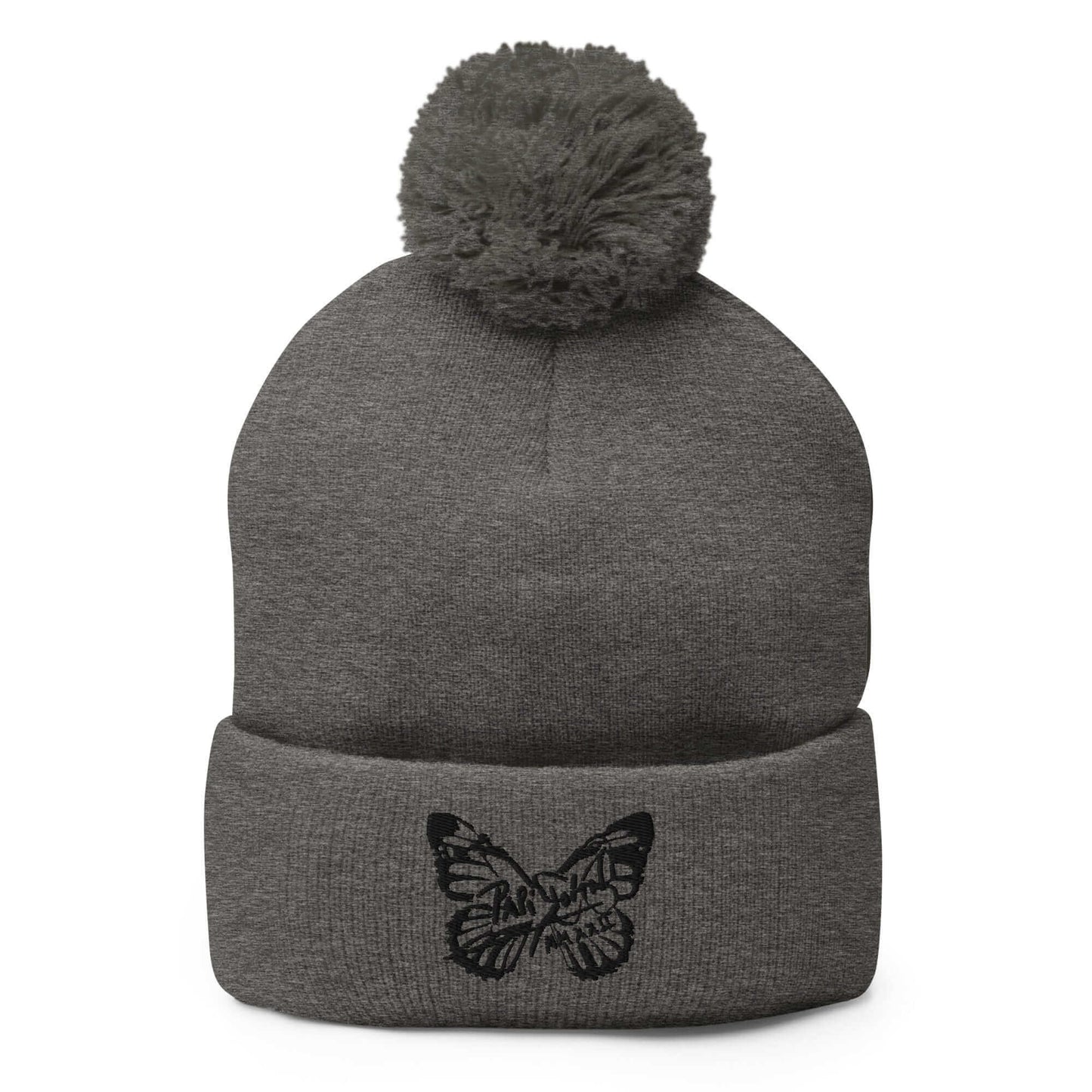PapiJohn® The Butterfly Signature Pom-Pom Beanie in deep dark heather grey front view tracking the fine monochrome black butterfly embroidery lines | Artist-Led Streetwear