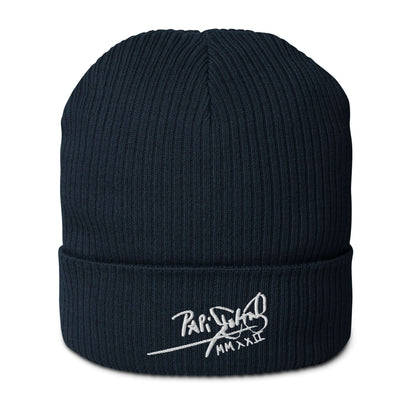 PapiJohn® The Eco-Signature Beanie premium eco-friendly headwear front view showcasing the classic white embroidered script signature on a deep navy blue double-layer organic cotton ribbed knit structure by $arah Free 💎 | Artist-Led Streetwear