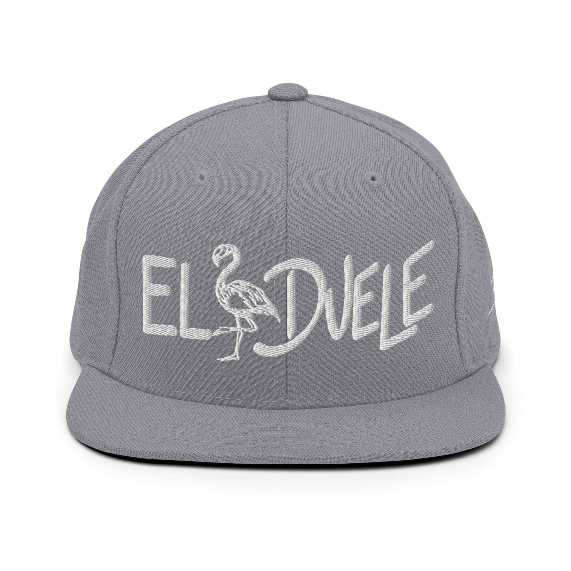 PapiJohn® The Flamenco 3D Signature Snapback in metallic silver canvas front view tracking the high-fidelity reflection of the 3D embroidered signature layout | Sala 1 Wearable Art Fashion