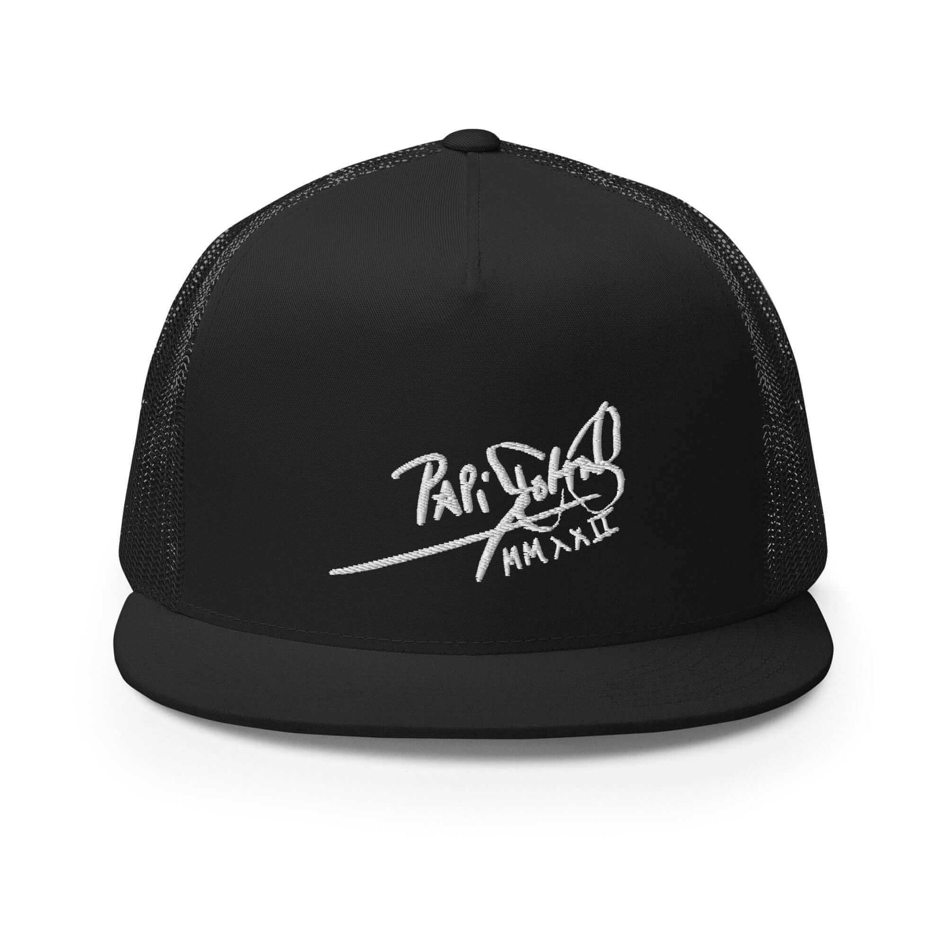 PapiJohn® The Flat Trucker Old School White Signature cap in solid black front layout rendering the high-fidelity contrast of the white thread embroidered branding script over the rigid crown | Sala 1 Wearable Art Fashion