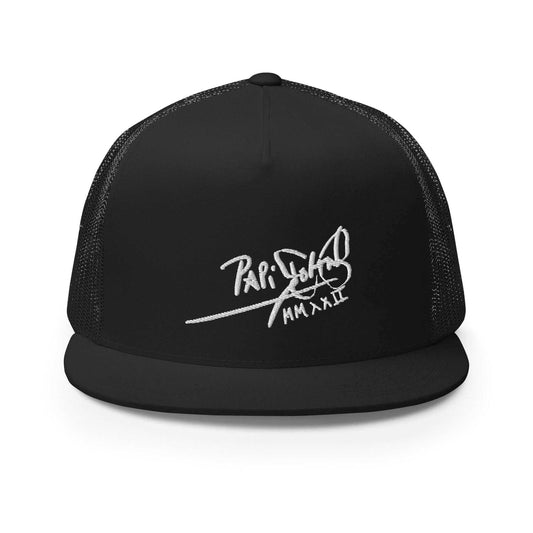 PapiJohn® The Flat Trucker Old School White Signature cap in solid black front layout rendering the high-fidelity contrast of the white thread embroidered branding script over the rigid crown | Sala 1 Wearable Art Fashion