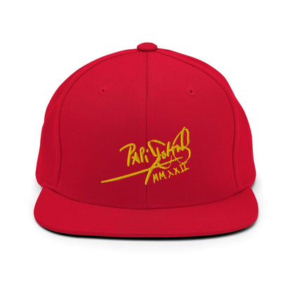 PapiJohn® The Gold Signature Classic Snapback in vibrant red front view focusing on the clean definitions of the gold tridimensional embroidered branding | Sala 1 Wearable Art Fashion