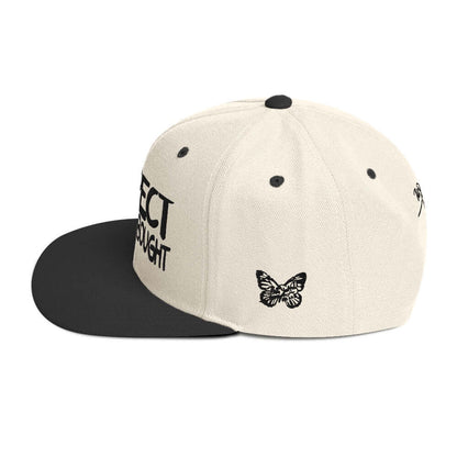 PapiJohn® The Respect Archive Black Signature Edition Snapback in natural raw tone left side profile highlighting the clean geometric crown structure and flat bill line | Streetwear d'Auteur
