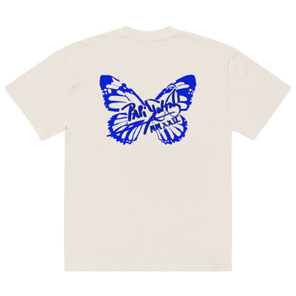 Back view showing the boxy fit and subtle off-white faded bone cotton texture of the SALA 3 | Attitude Oversize Blue Eco Canvas by PapiJohn®. Gallery archive piece and honest luxury streetwear curated in Cadifornia by $arah Free 💎.