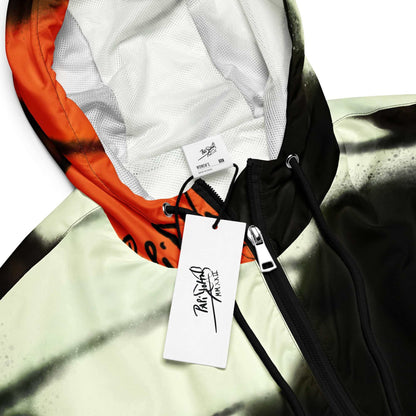 Close-up detail view highlighting the iconic heritage orange monarch butterfly print texture, weather-resistant technical fabric, and custom brand hardware on the SALA 3 | Artist Choice | Crop Monarca Origin Windbreaker by $arah Free 💎. Honest luxury studio gear curated in Cadifornia.