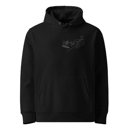 Front view of the SALA 5 | The Skate Ollie luxury streetwear piece | Heavyweight Eco Canvas Hoodie in black by PapiJohn®. Featuring a skate ollie graphic artwork over the signature V-matrix logo on heavy organic black canvas by $arah Free 💎. High-end conscious luxury streetwear de autor curated in Cadifornia. Premium Street-Couture for global collectors | Papijohn® Archive