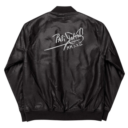 PapiJohn® 🏛️ Sala 9 | Vegan Leather Bomber | The Core Armor — Back view featuring the full-size embroidered PapiJohn® classic signature graphic across high-grade vegan leather by $arah Free 💎. Gallery archive piece, conscious luxury outerwear, and wearable art curated in Cadifornia.