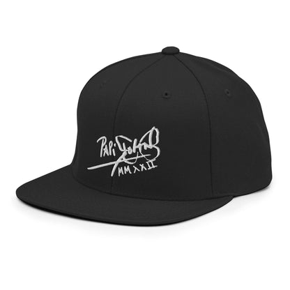 PapiJohn® The Signature High-Crown Snapback premium headwear left side profile focusing on the high-crown black geometric silhouette and wool blend textile weave by $arah Free 💎 | Artist-Driven Streetwear