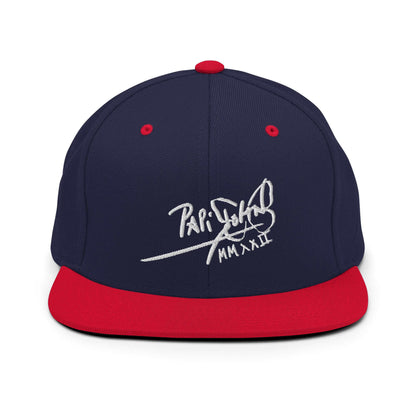 PapiJohn® The Signature High-Crown Snapback premium headwear front view showcasing the white embroidered original signature on a deep navy crown paired with a bold red visor by $arah Free 💎 | Streetwear d'Auteur