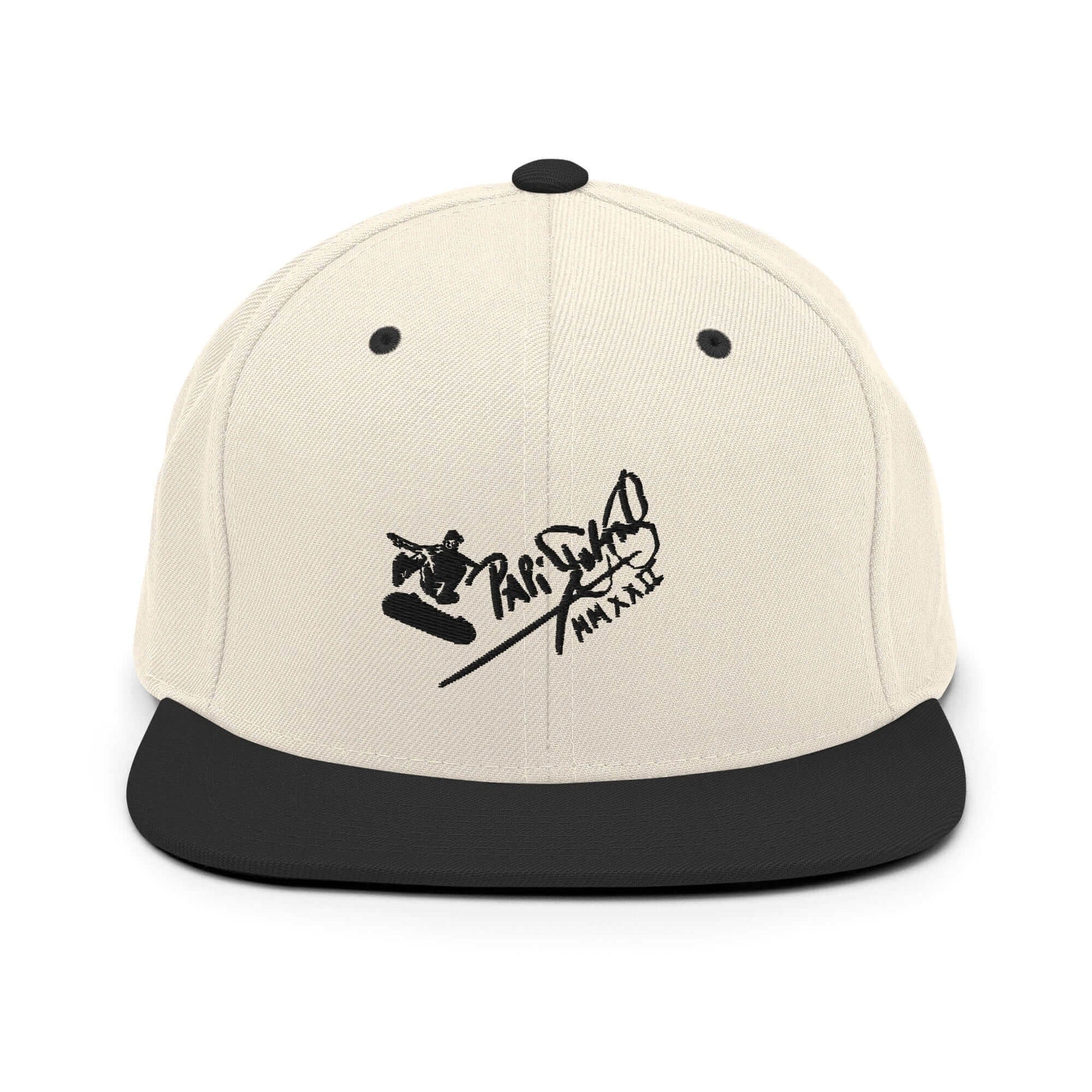 PapiJohn® The Skate Archive Signature Snapback in raw natural and black panels front view rendering the ultimate organic contrast for the black skate embroidery | Sala 1 Wearable Art Fashion