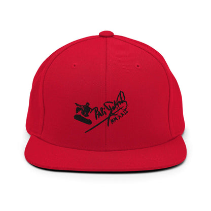 PapiJohn® The Skate Archive Signature Snapback in vibrant crimson red front view accentuating the sharp contrast of the black high-relief embroidered art | Sala 1 Wearable Art Fashion
