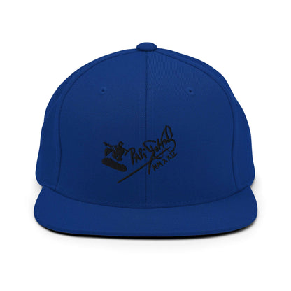 PapiJohn® The Skate Archive Signature Snapback in electric royal blue front layout presenting the high-density black embroidered skater motif with maximum visual sharpness | Sala 1 Wearable Art Fashion