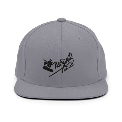 PapiJohn® The Skate Archive Signature Snapback in metallic silver canvas front view focusing on the clean definitions of the volumetric black embroidered text | Sala 1 Wearable Art Fashion