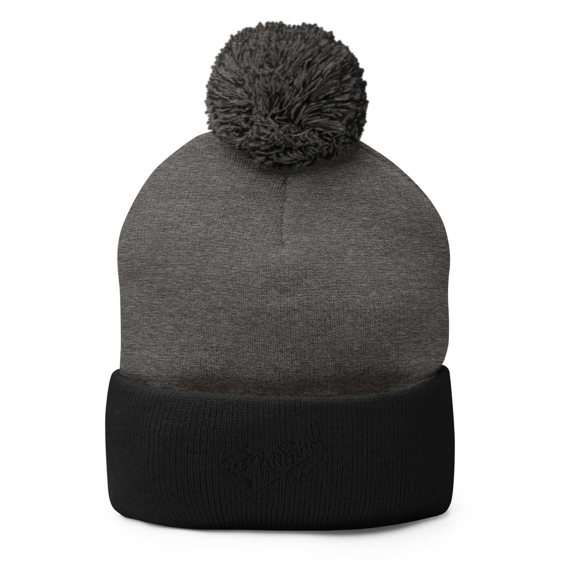 PapiJohn® The Skate Signature Pom-Pom Beanie in dark heather grey and solid black contrast front view highlighting the precision embroidery lines and clean rib finish | Sala 1 High-End Curation