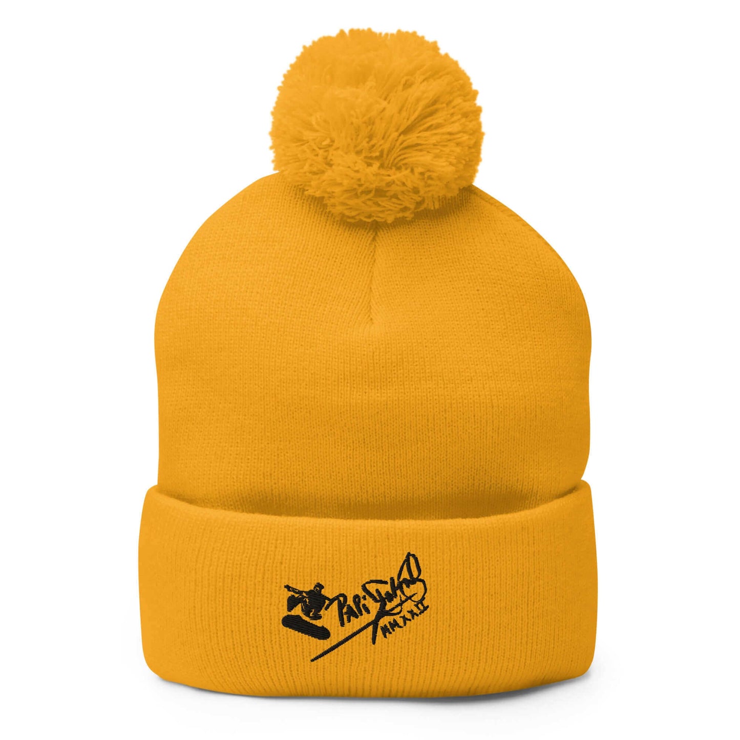 PapiJohn® The Skate Signature Pom-Pom Beanie in heraldic gold thread and knit tone front view presenting the exquisite kinetic typography layout work | High-End Subcultural Archive