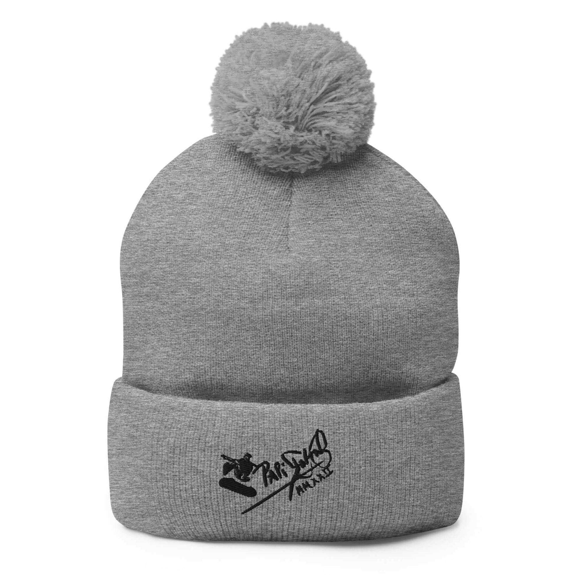 PapiJohn® The Skate Signature Pom-Pom Beanie in timeless heather grey textured knit front view showcasing the fluid signature design and symmetrical crown shape | Streetwear d'Auteur