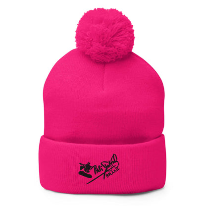 PapiJohn® The Skate Signature Pom-Pom Beanie in high-voltage neon pink front view accentuating the vibrant color canvas and crisp embroidered skate icon by $arah Free 💎 | Wearable Art Fashion