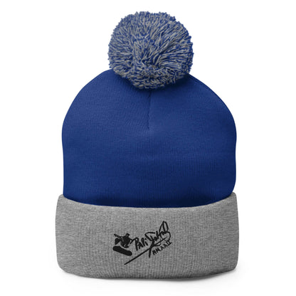 PapiJohn® The Skate Signature Pom-Pom Beanie in royal blue and heather grey dual-tone texture front view tracking the high-fidelity embroidered skate lettering layout | Artist-Led Streetwear