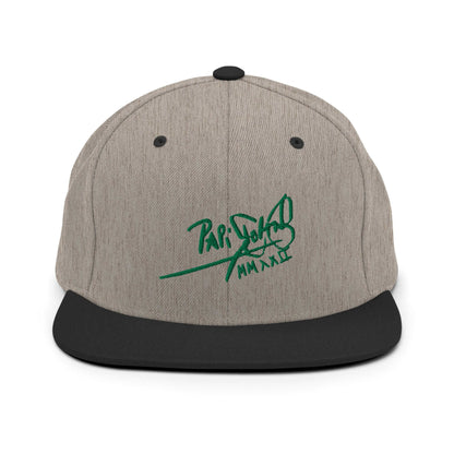 PapiJohn® The Green Signature Classic Snapback in black heather textured weave front view tracing the green calligraphic text over the curated grain matrix | Sala 1 Wearable Art Fashion