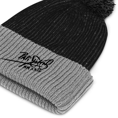 PapiJohn® Macro technical close-up focusing on the high-density absolute black thread calligraphic signature script embroidered over the premium ribbed knit fabric fold by $arah Free 💎 | High-Tier Archive