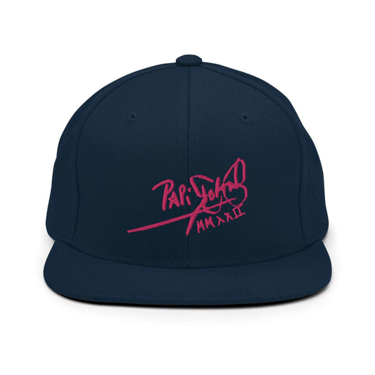 PapiJohn® The Pink Signature Classic Snapback in deep dark navy front view highlighting the intense contrast of the vibrant pink calligraphic branding text embroidered in high-density relief | Sala 1 Wearable Art Fashion