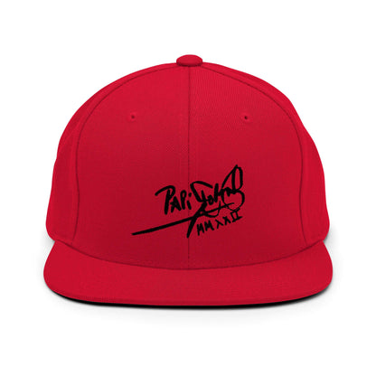 PapiJohn® The Shadow Signature Multicolor Snapback in solid crimson red front view displaying the absolute black calligraphic branding text embroidered in high-density relief | Sala 1 Wearable Art Fashion